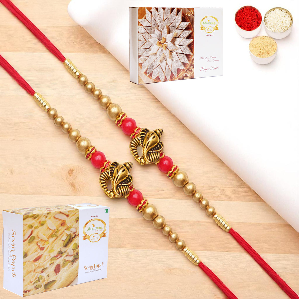 Set of 2 - Y-26 Ganesha divine Rakhi with 200 gms of Kaju katli and 200 gms of Soan Papdi
