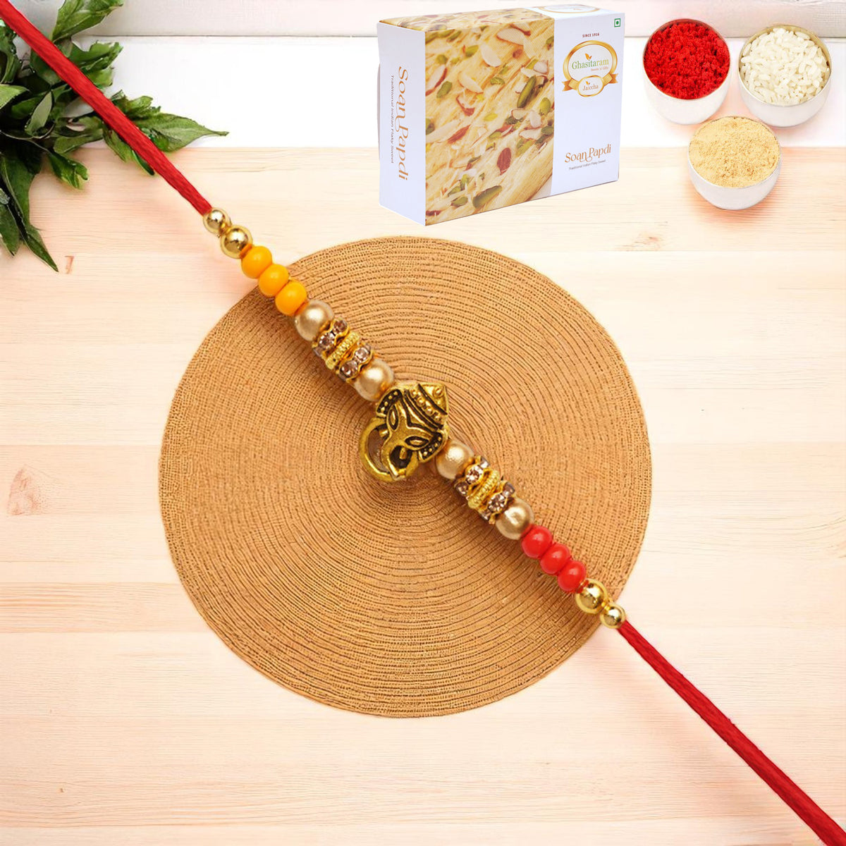 Y-58 Ganesha divine Rakhi with 400 gms of Soan Papdi