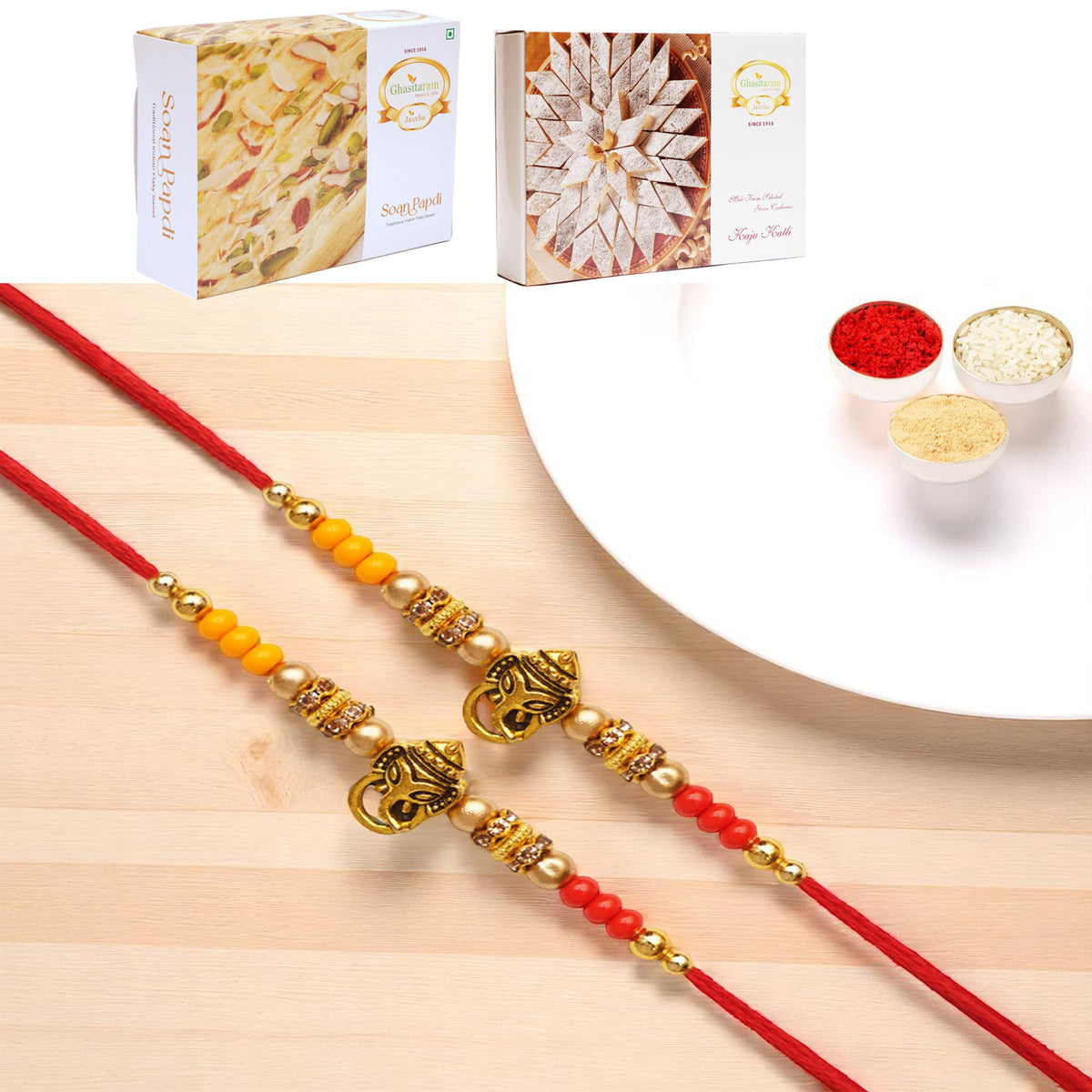 Set of 2 - Y-58 Ganesha divine Rakhi with 200 gms of Kaju katli and 200 gms of Soan Papdi