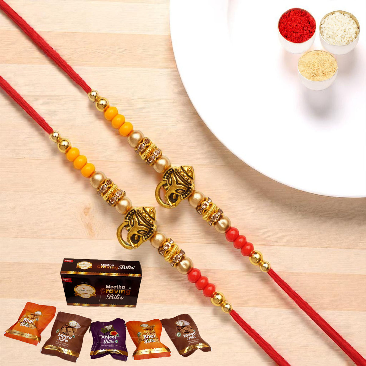 Set of 2 - Y-58 Ganesha divine Rakhi with Asorted bites box