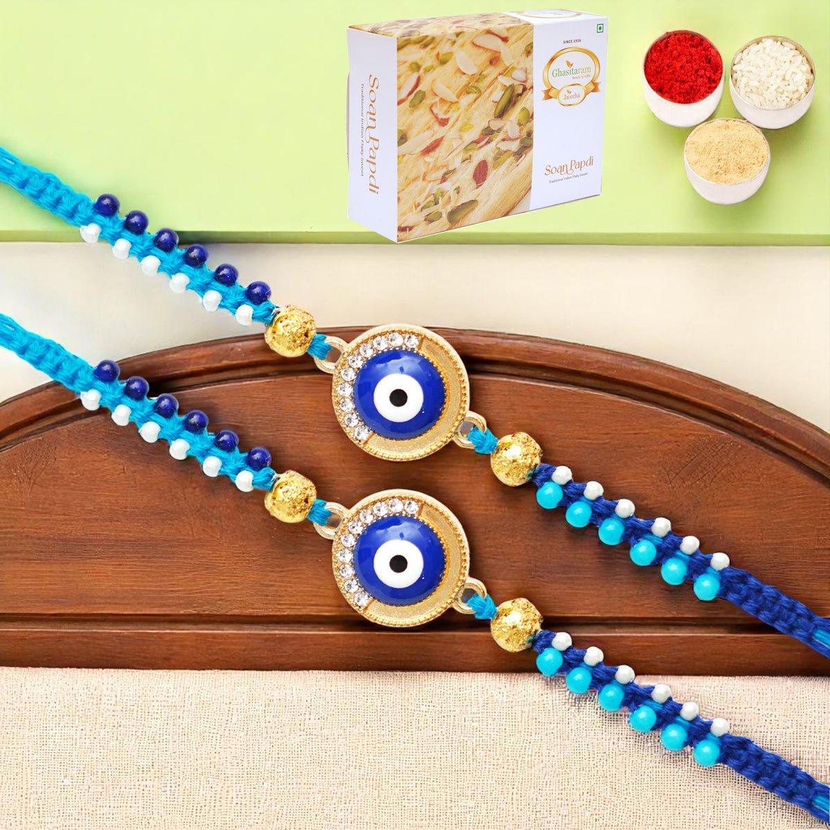 Rakhis Online Australia-Set of 2 - X-134 evil Eye Fancy Rakhi with 200 gms of Soan Papdi