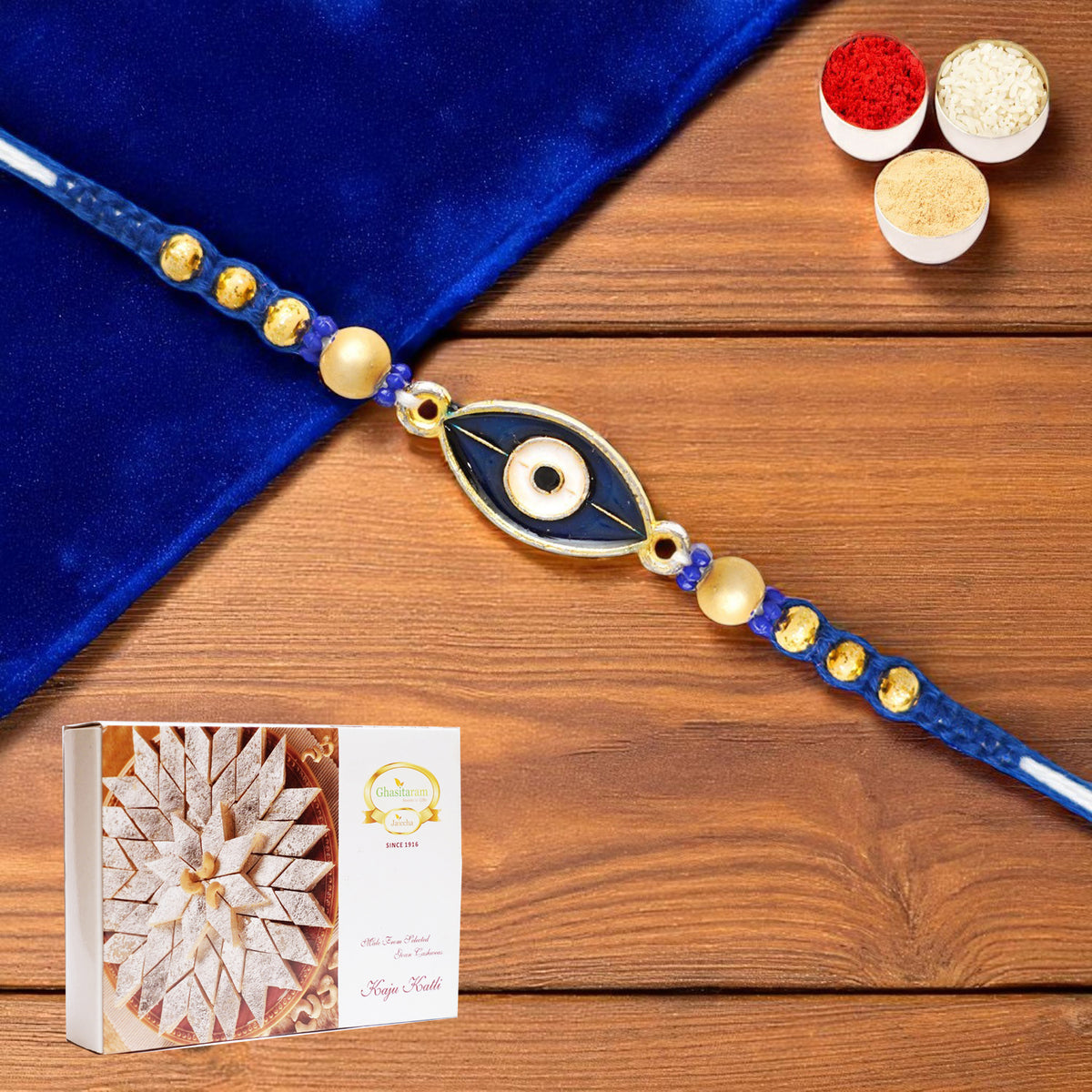 X-86 Evil Eye Fancy Rakhi with 400 gms of Kaju katli