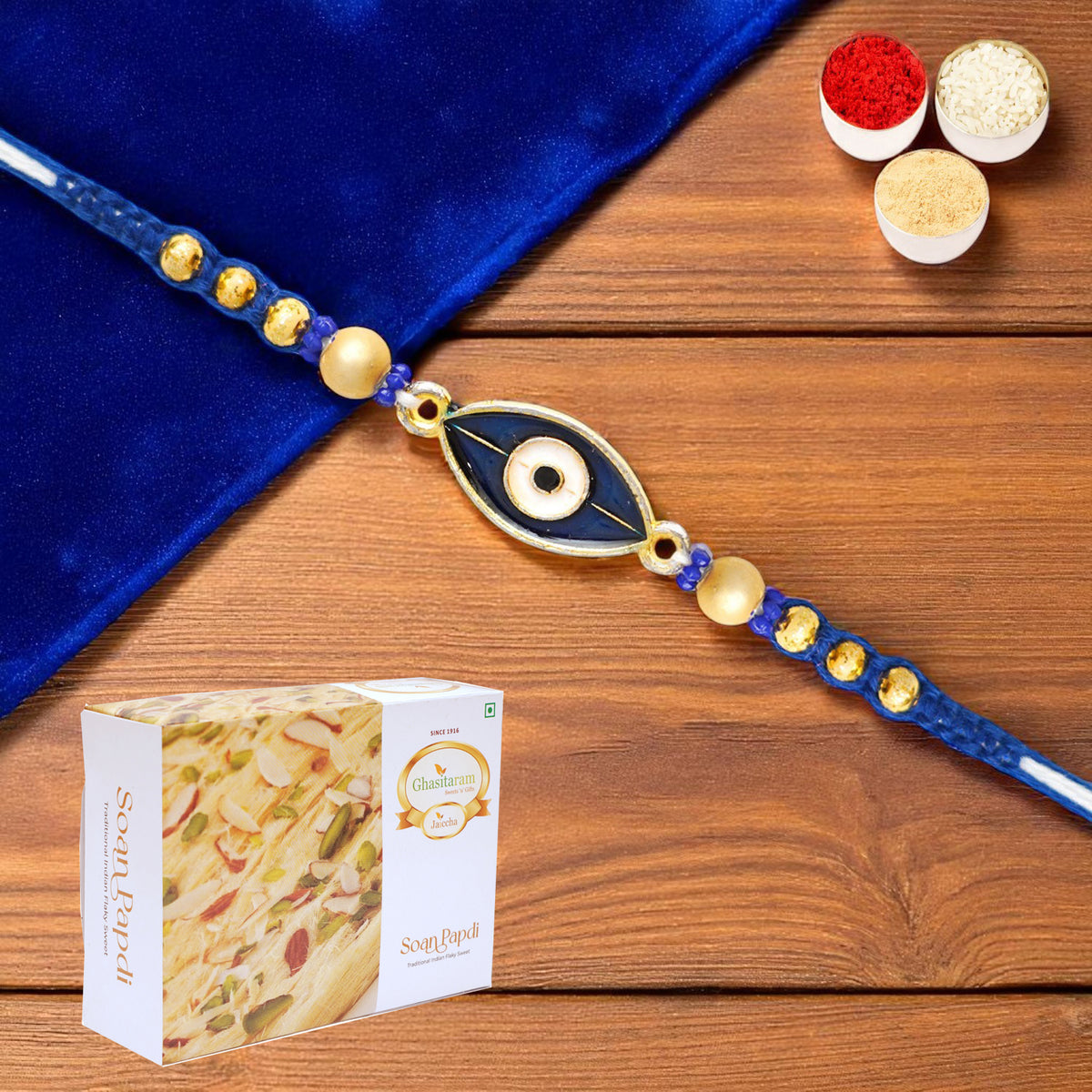 X-86 Evil Eye Fancy Rakhi with 400 gms of Soan Papdi