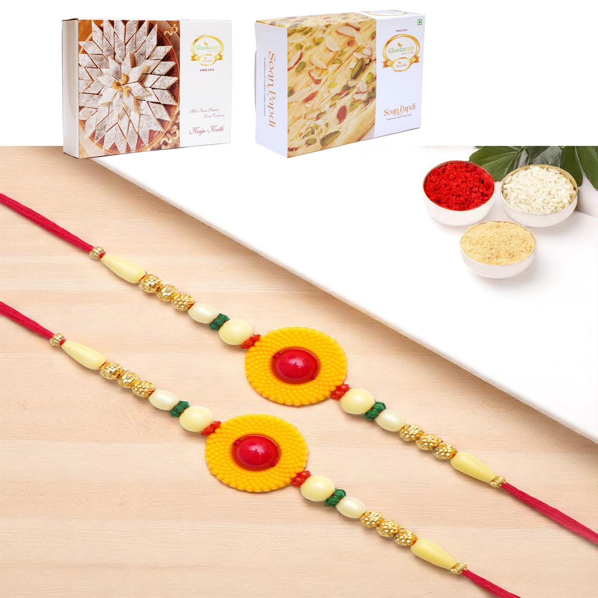 Set of 2 -  Y-199 Fancy Rakhi with 200 gms of Kaju katli and 200 gms of Soan Papdi