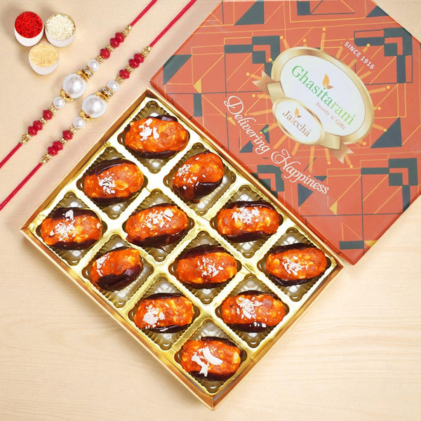 Rakhi Gifts-Orange Stuffed Dates 12 pcs in premium box with 2 rakhis