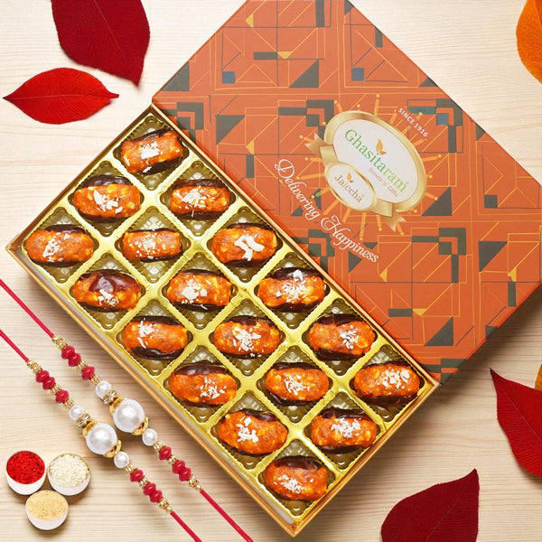 Rakhi Gifts-Orange Stuffed Dates 18 pcs in designer box with 2 rakhis