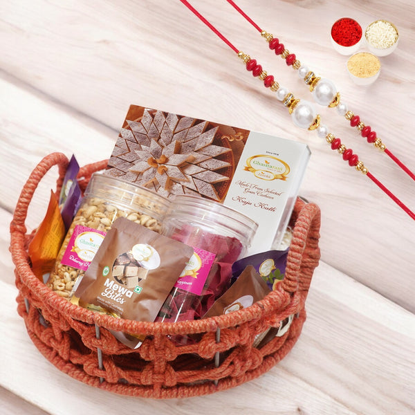 Orange Jute Basket With Kaju Katlis/ Namkeen and Bites with 2 rakhis