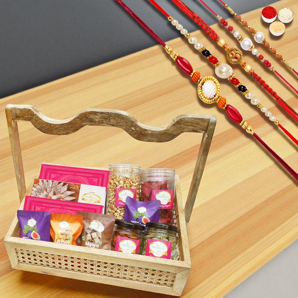 Rattan Basket of 12 goodies with 3 sweets boxes with 5 rakhis