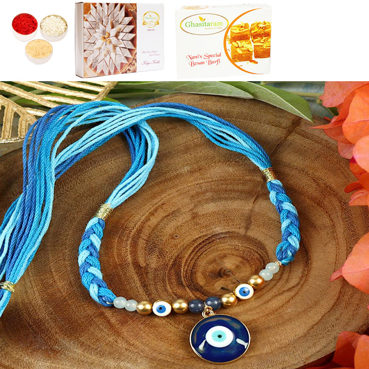 ST25-009-Evil Eye With Thread Weave Design Premium Rakhi  with 200 gms of Besan Barfi and 200 gms of Kaju Katli