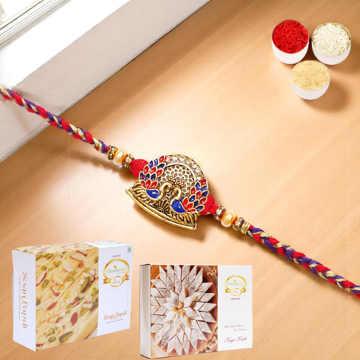 K-178 Premium Rakhi with 200 gms of Kaju katli and 200 gms of Soan Papdi