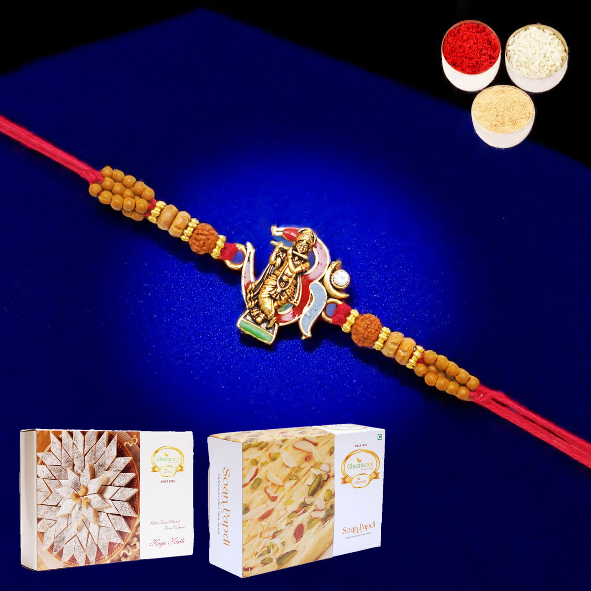 K-23 Om Krishna Premium Rakhi with 200 gms of Kaju katli and 200 gms of Soan Papdi
