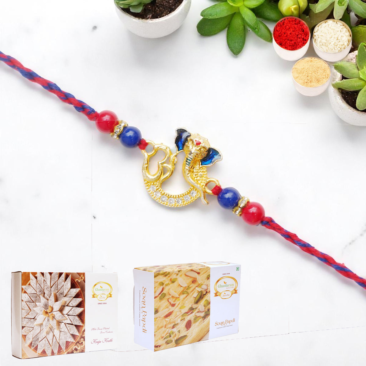 Om Ganesha Premium Rakhi- K-47 with 200 gms of Kaju katli and 200 gms of Soan Papdi