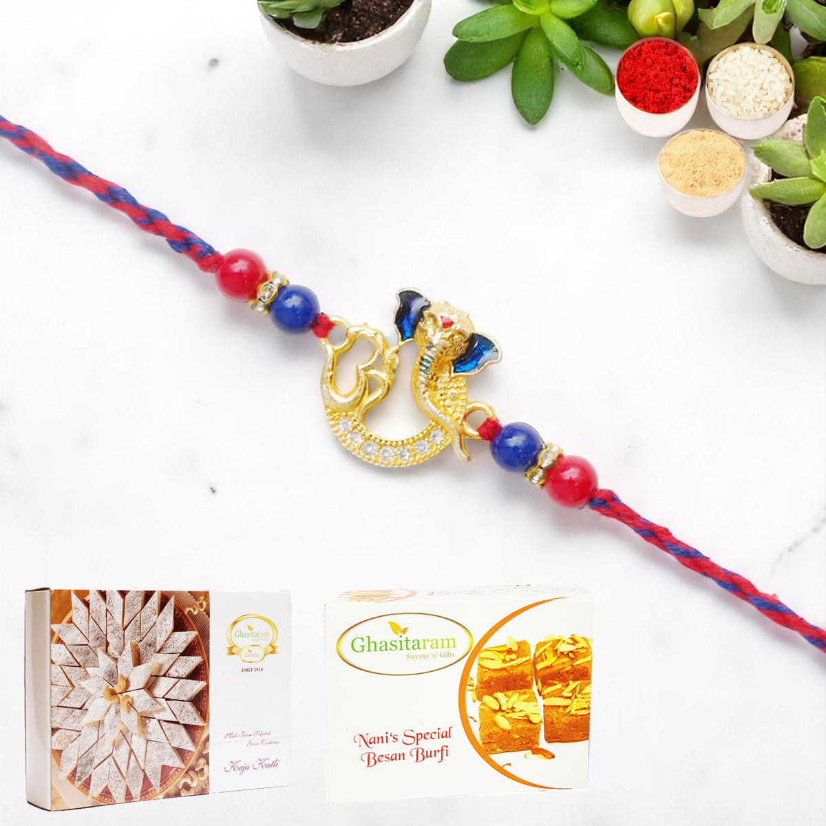 Om Ganesha Premium Rakhi- K-47 with 200 gms of Besan Barfi and 200 gms of Kaju Katli