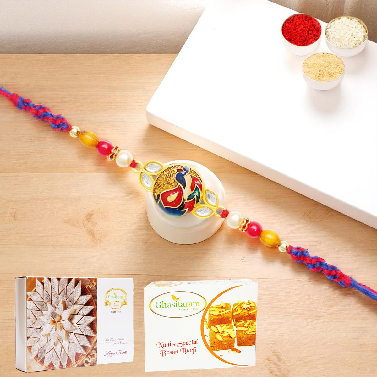 K-73 Premium Rakhi with 200 gms of Besan Barfi and 200 gms of Kaju Katli