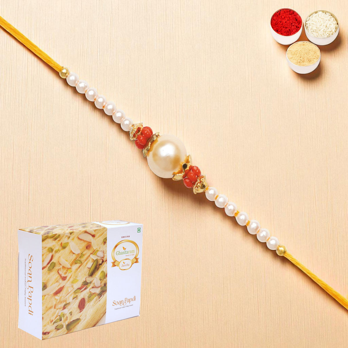 Y-34 Pearl rakhi with 400 gms of Soan Papdi