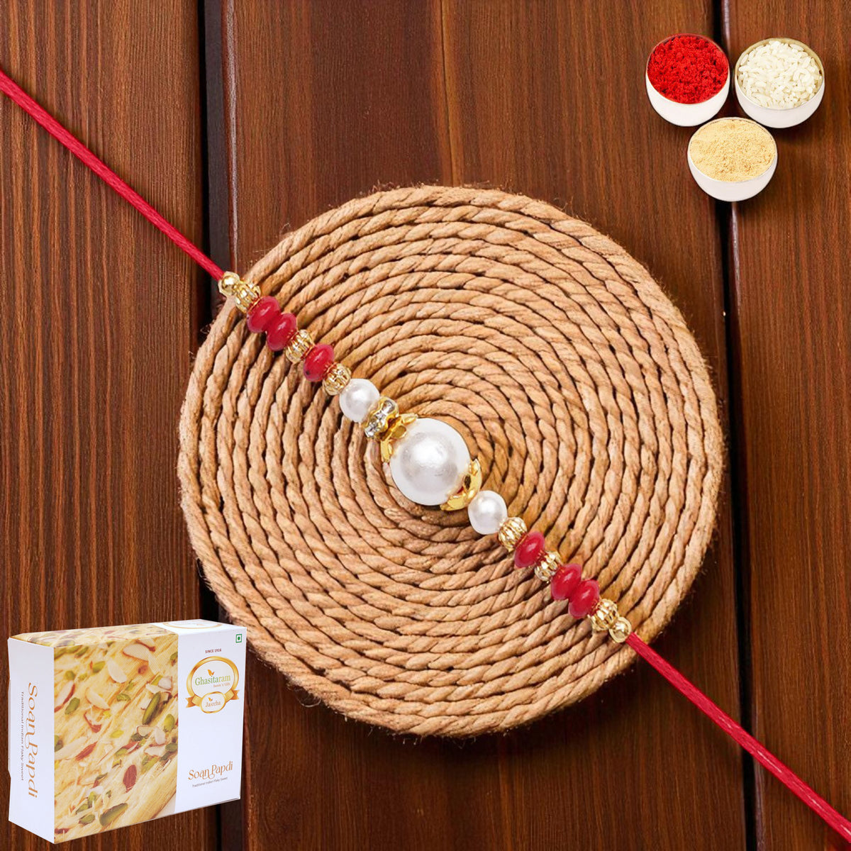 Y-44 Red Pearl rakhi with 400 gms of Soan Papdi