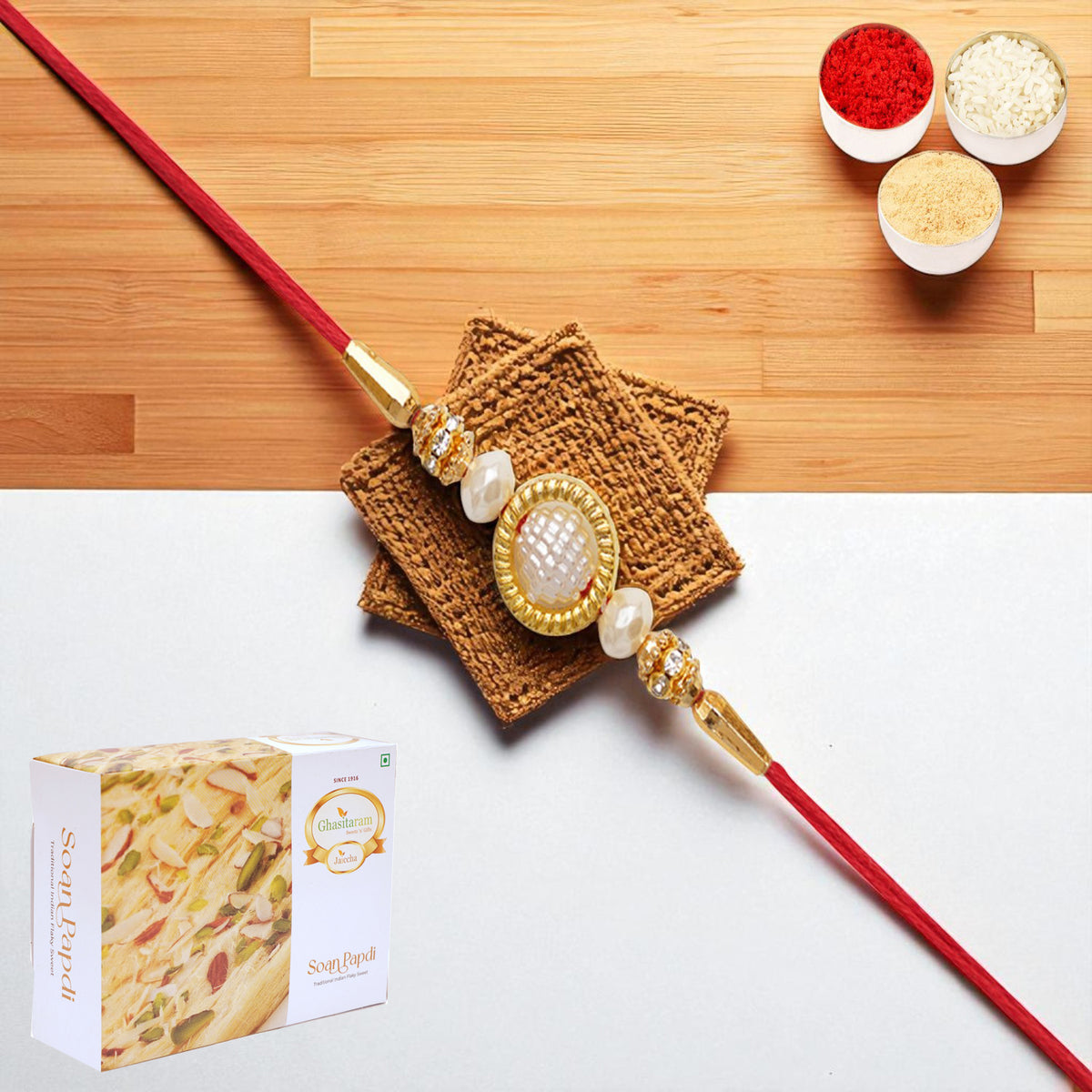 Y-84 Pearl rakhi with 400 gms of Soan Papdi