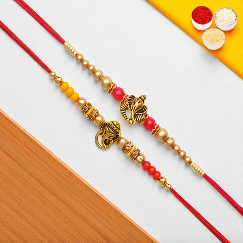 Rakhis Online Australia-Set of 2 y26 and y58 om ganesh divine rakhis