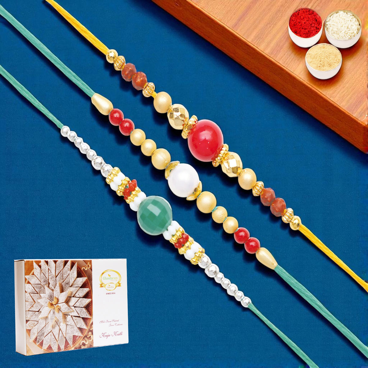 Rakhis Online USA-Set of 3 Pearl rakhis abc (83, 87, 159) with 200 gms of Kaju katli