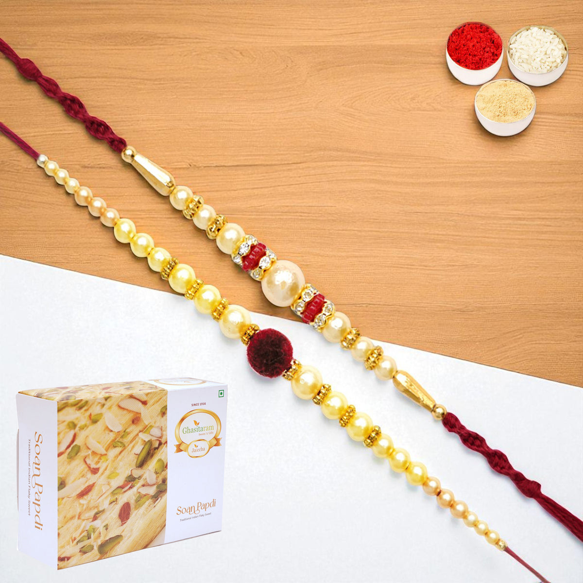 Set of 2 y 37 and y 83 pearl rakhis with 400 gms of Soan Papdi
