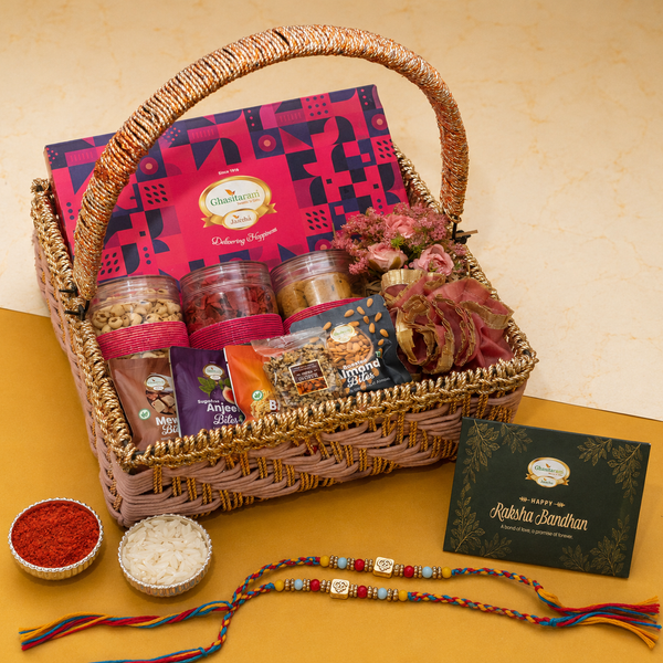 Pink Rope Basket of 15 goodies of Assorted Sweets, / Namkeen and Dryfruit with 2 Premium Om rakhis