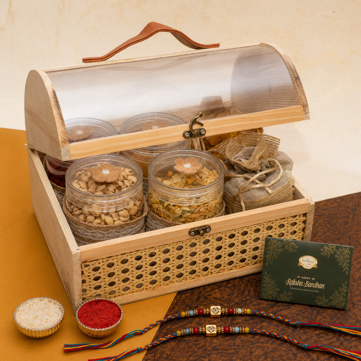 Rattan Trunk Box of Mithai/Sweet Pouches, 4 Namkeens and Dryfruit with 2 Om Premium Rakhis