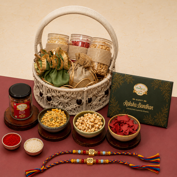 Round Macrame Basket of Namkeens, Mithai/Sweet pouches and Dryfruit with 2 Om Premium Rakhis