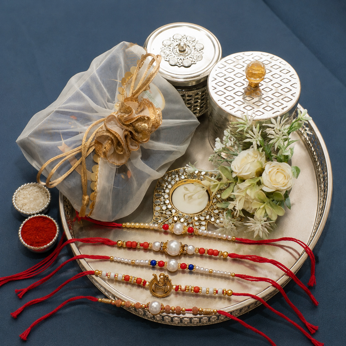 Silver round Tray of Besan Laddoo/ Mithai/ Sweet Pouches and Dryfruit With 5 Thread Rakhis