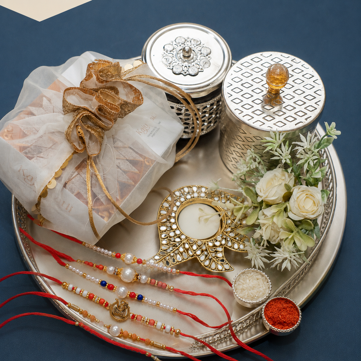 Silver round Tray of Kaju Katli/ Mithai/ Sweet Pouches and Dryfruit With 5 Thread Rakhis