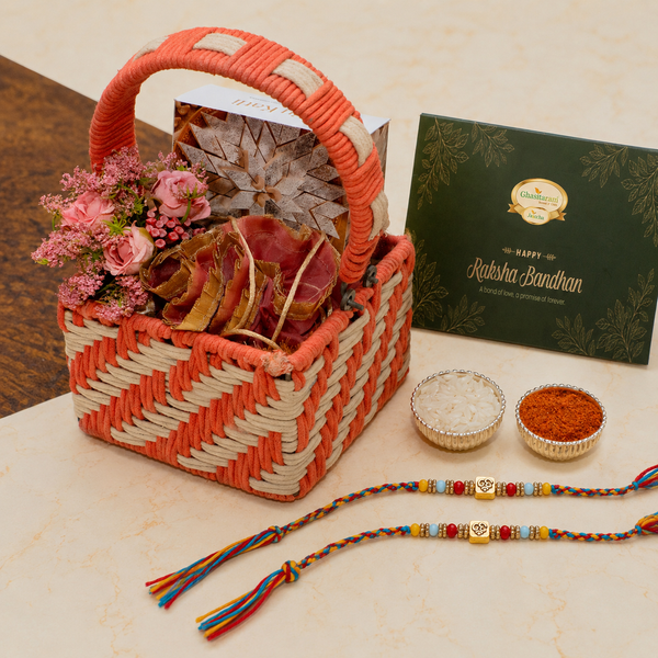Small Red Rope basket of kaju Katlis and Chocolate Almonds with 2 Premium Om rakhis