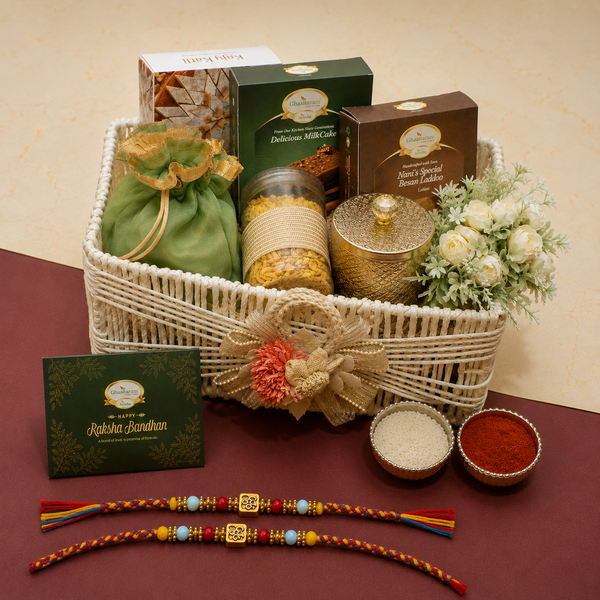 White Jute Basket of Kaju Katlis, Milk cake, Besan Barfi, Namkeen abd Dryfruit with 2 Om Premium Rakhis