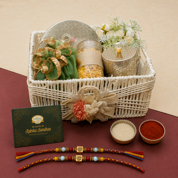 White Jute Basket of Assorted Laddoos and Namkeen with 2 Rakhis