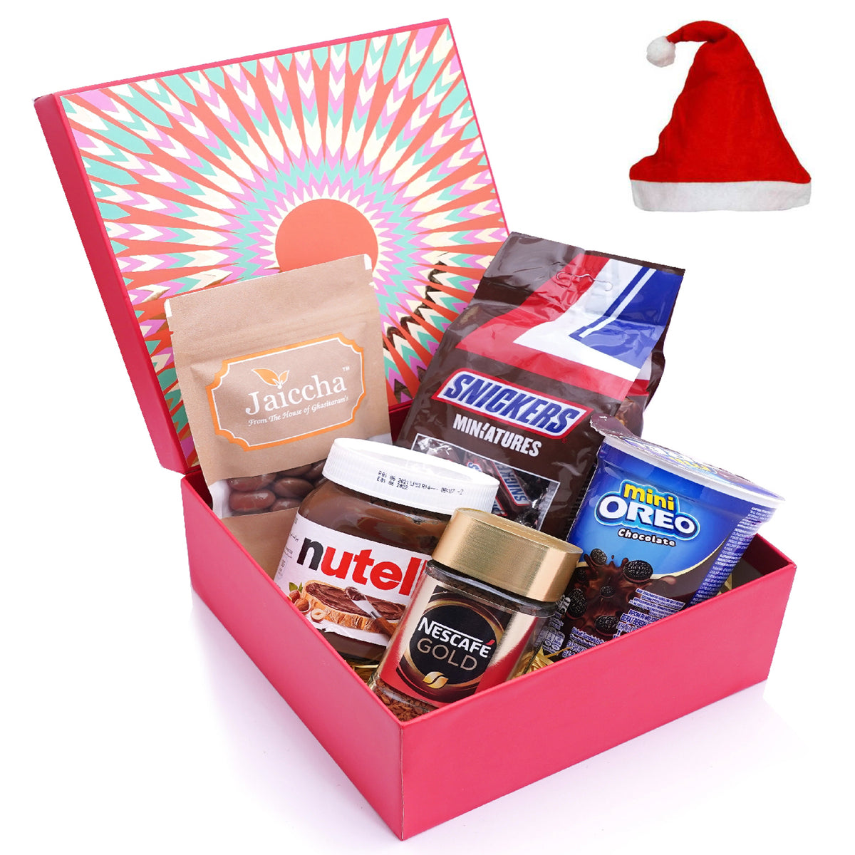 Red hamper box of Snickers, Chocolate Coated Almonds, Coffee Coffee (50 gms), Hazelnut Chooclate Spread and Mini Oreo
