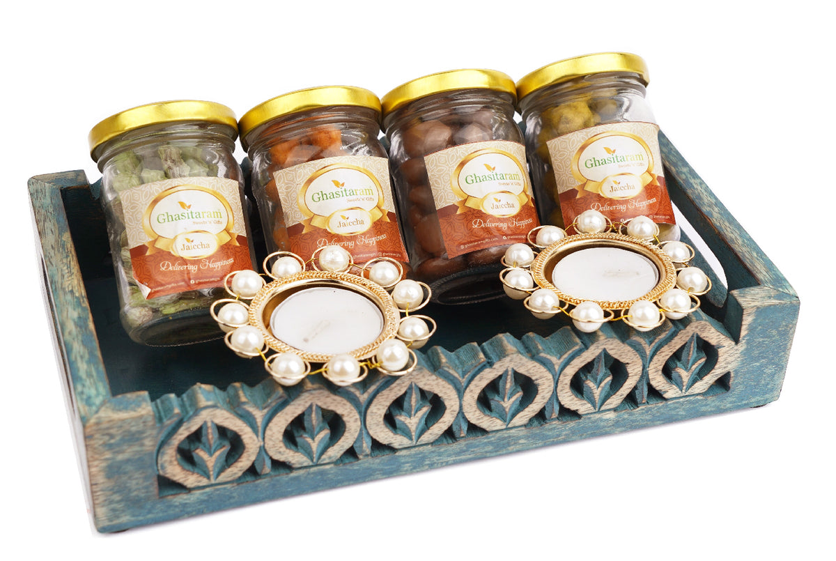Blue Wooden Serving Tray with Paan Raisins, Crunchy Coated Cashews, Chocolate Coated Almonds, Crunchy Coated Peanuts and T-lites
