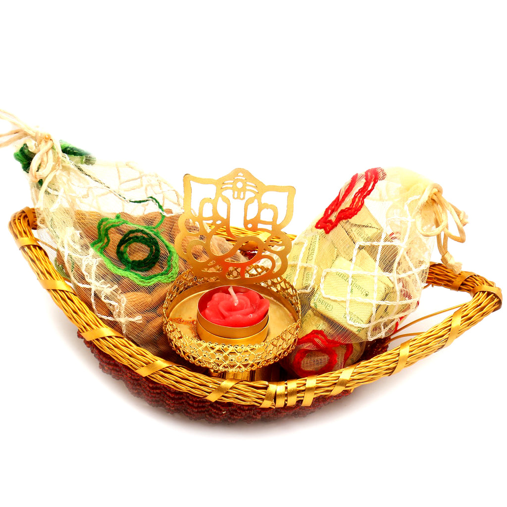 Boat Basket with Almonds, Chocolate Pouches and Ganesha T- Lite