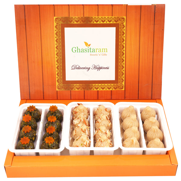 Pure Kaju Badam Pista Modaks in orange box