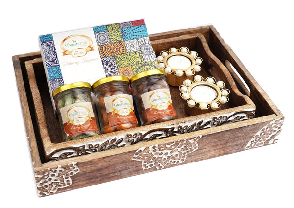 Wooden Serving Tray with Assorted bites, Paan Raisins, Crunchy Coated Cashews, Chocolate Coated Almonds and T-lites