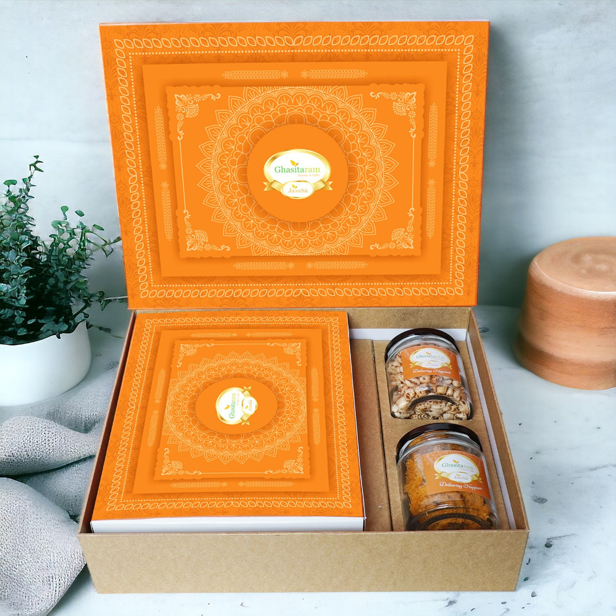 Holi Sweets| Holi Hampers| Holi Gifts Ghasitaram Orange Hamper Box with Sugarfree Wheat Gujiyas, Wheat puffs and Moong Chakli