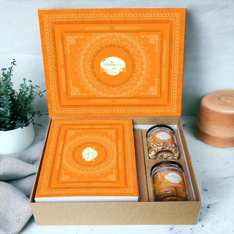 Holi Sweets| Holi Hampers| Holi Gifts Ghasitaram Orange Hamper Box with Sugarfree Wheat Gujiyas, Wheat puffs and Moong Chakli