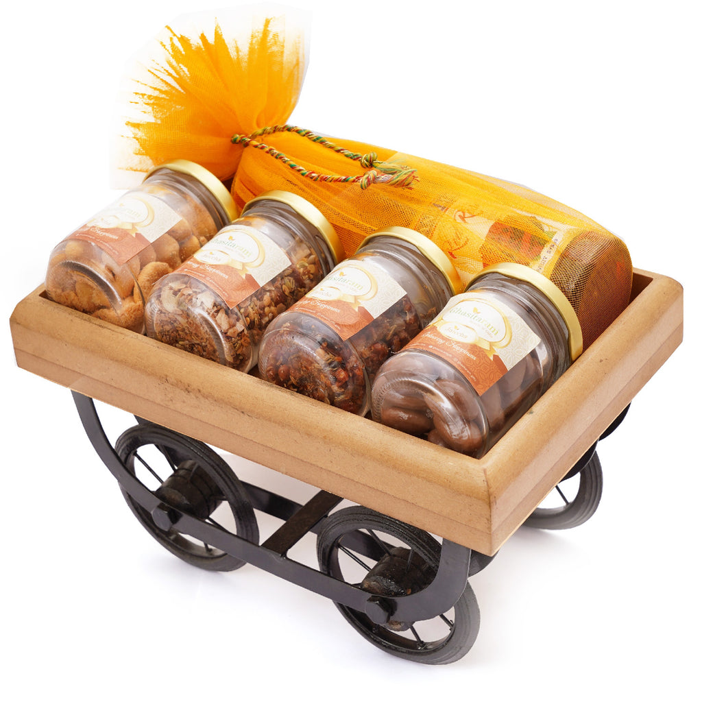 Wooden Cart of Crunchy Cashews, Banarsi Paan Raisins, Banarsi Paan, Chocolate Almonds and Sharbat