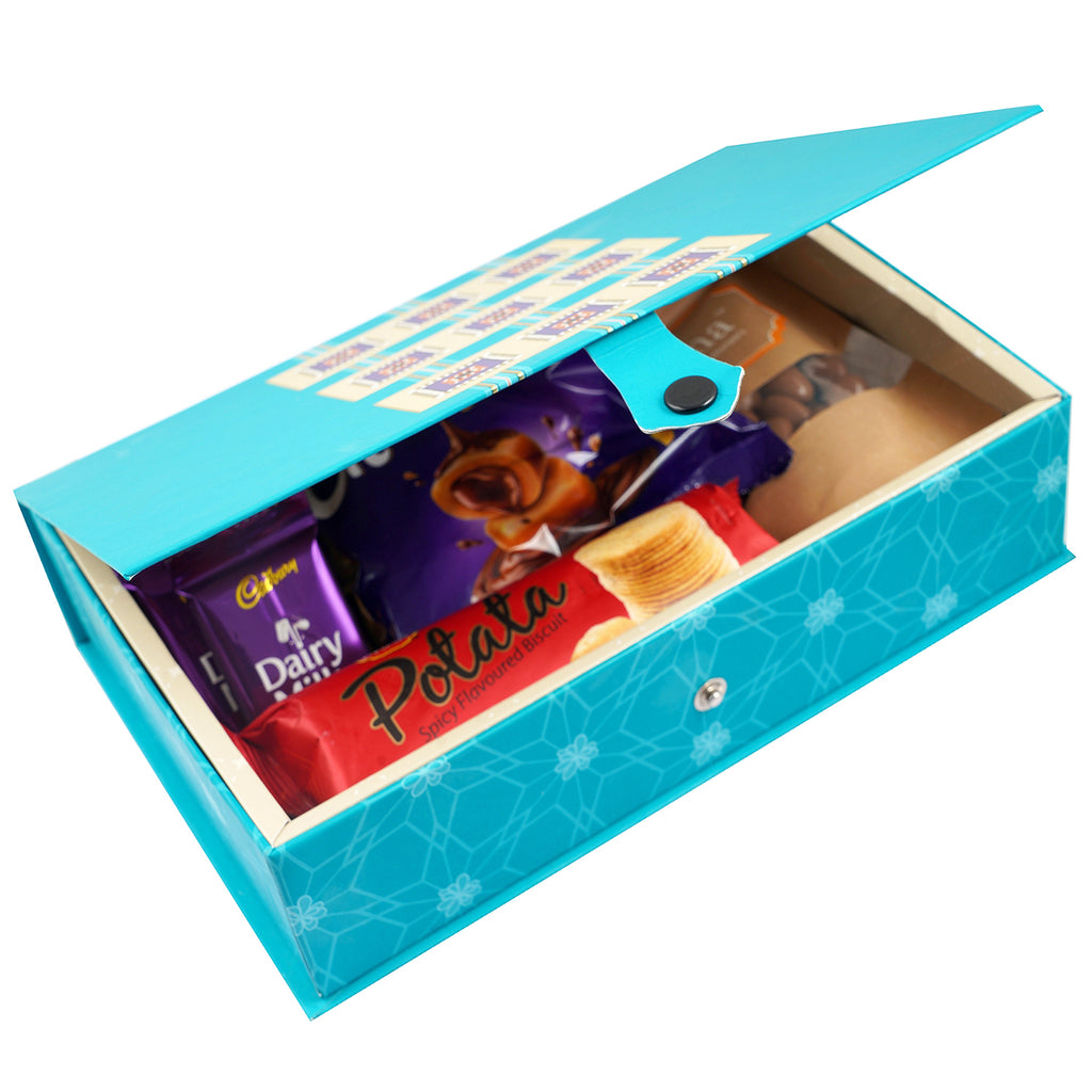Blue Rectangular box of Dairy Milk , Eclairs, 5 star, Chocolate Almonds, Potata Biscuits 