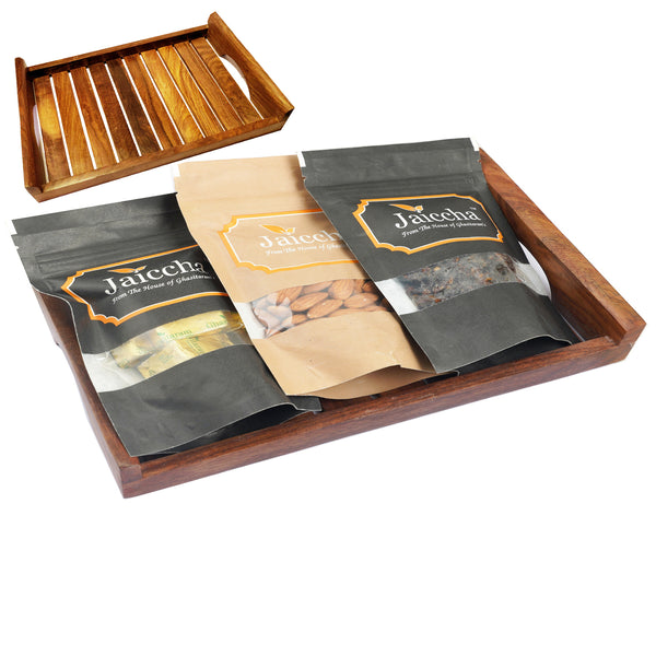 Striped Wooden Tray of Almonds, Mewa Bites and Banarsi Paan.