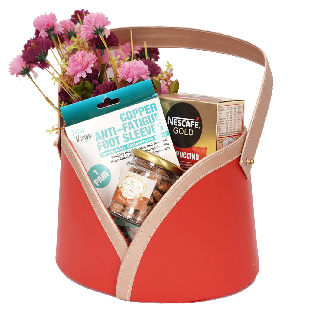 Mothers Day-Red basket of Flowers, Cappuccino, Foot Sleeves and Caramel Almonds Jar