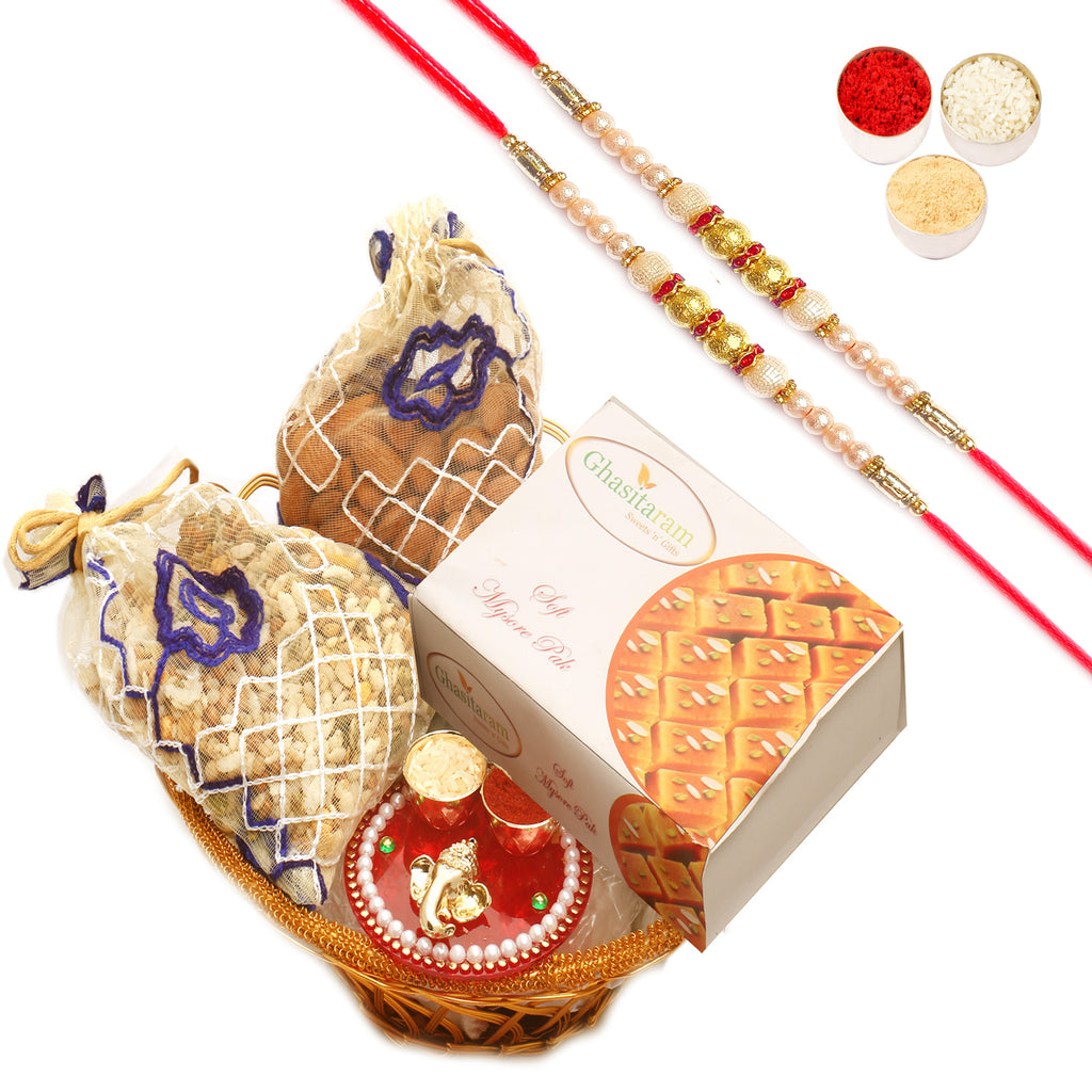 Gold Wired Basket with Mysore Pak, Almonds, Namkeen Pouch with Mini pooja Thali with 2 Pearl Rakhis