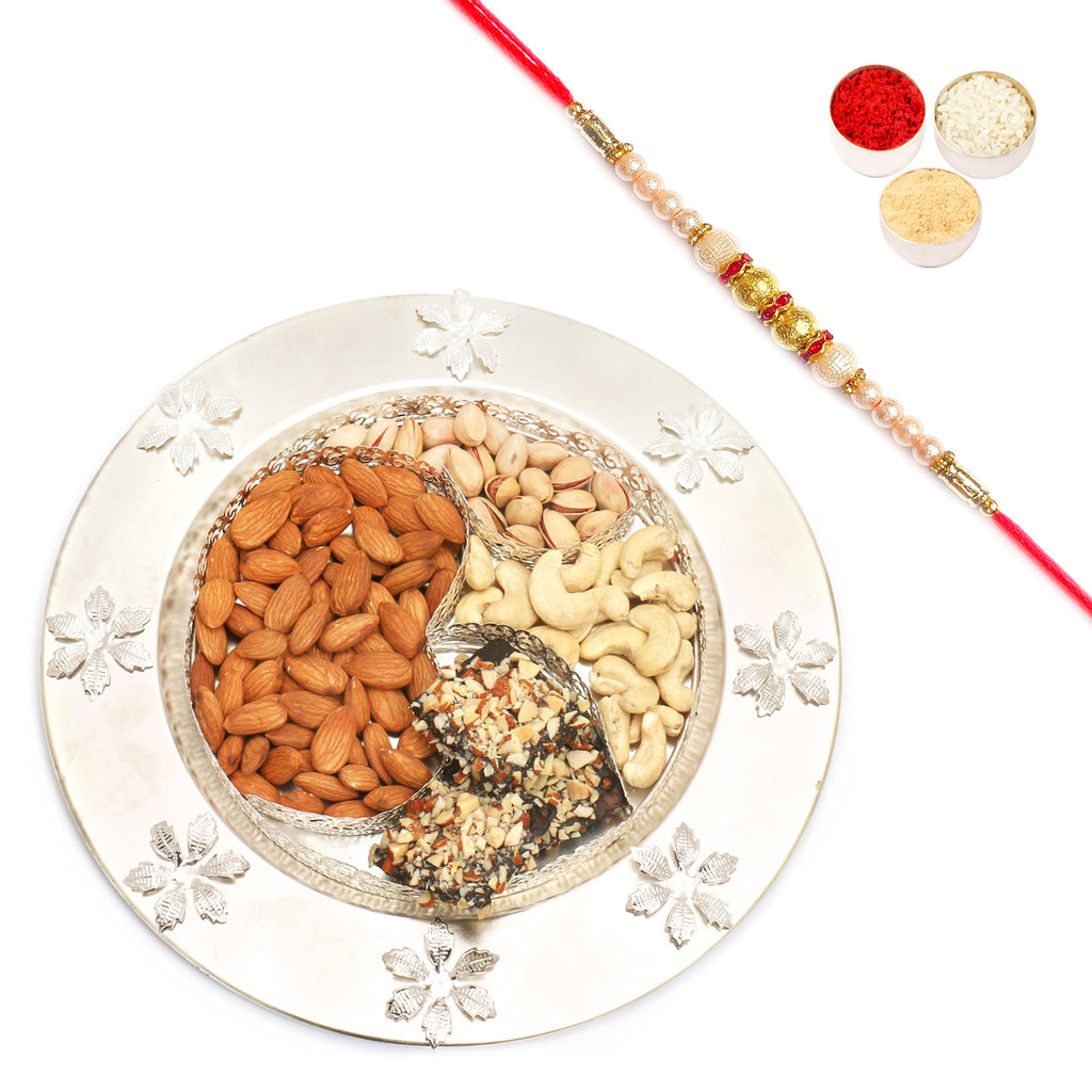 Om almonds, pistachios, cashews,brittles with Pearl Rakhi