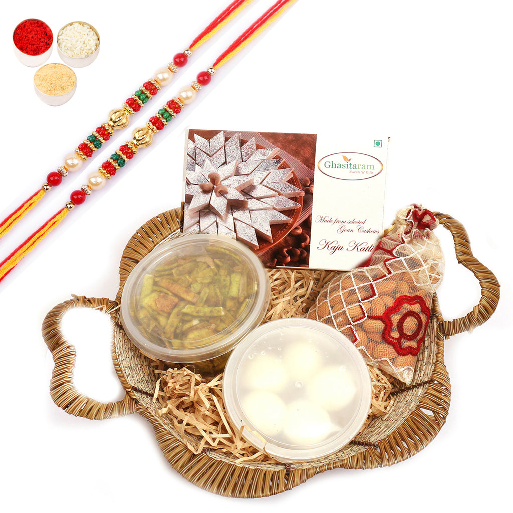 Brown Basket Of Rasgullas, Kaju Katli, Palak Chips and Almonds Pouch with 2 Pearl beads rakhi