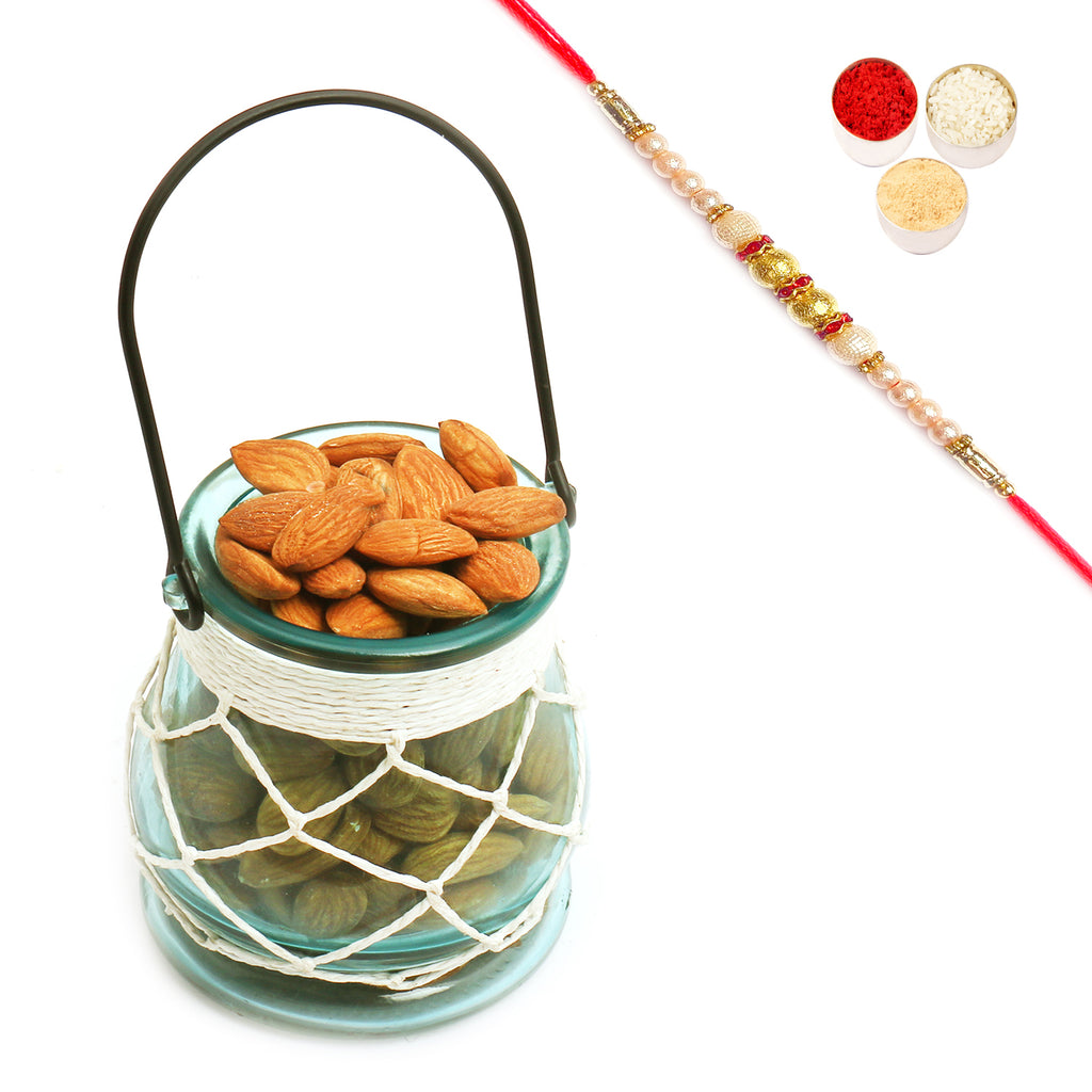 Glass T- Lite Holder with Almonds with Pearl Rakhi