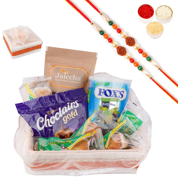 Rakhi Gifts-Shaded Jute Potli with Rice Crispies, Chocolairs, Foxs and Honey Bell with 2 Rudraksh Rakhis