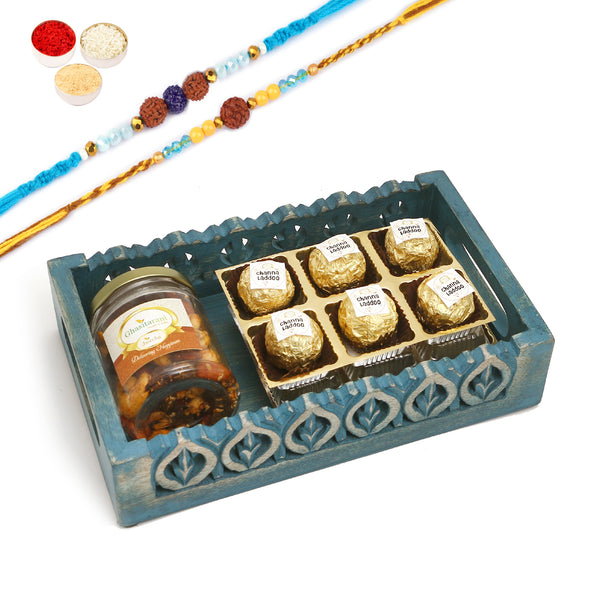 Rakhi Gifts-Blue wooden Tray with Channa Laddoos and Mix Dryfruits Jar With 2 blue rudraksh rakhis