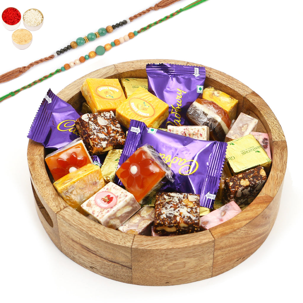 Rakhi Gifts-Round Printed Tray of Assorted Bites and Cookies With 2 Green Beads Rakhis
